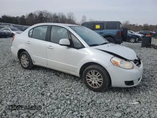 2013 Suzuki SX4 LE with VIN JS2YC5A37D6101979, listed as a Copart auction lot 42185855 with 118,855 mi miles and Salvage Title. Bid and sale history available at carsss.com. Image 4.