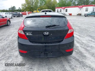 2014 Hyundai Accent GS with VIN KMHCT5AE7EU164658, listed as a IAAI auction lot 41911092 with 132,442 mi miles. Bid and sale history available at carsss.com. Image 16.