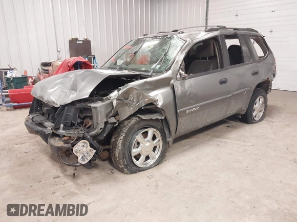 2005 GMC Envoy SLT with VIN 1GKDT13S352257892, listed as a IAAI auction lot 41690880 with 134,216 mi miles. Bid and sale history available at carsss.com. Image 2.