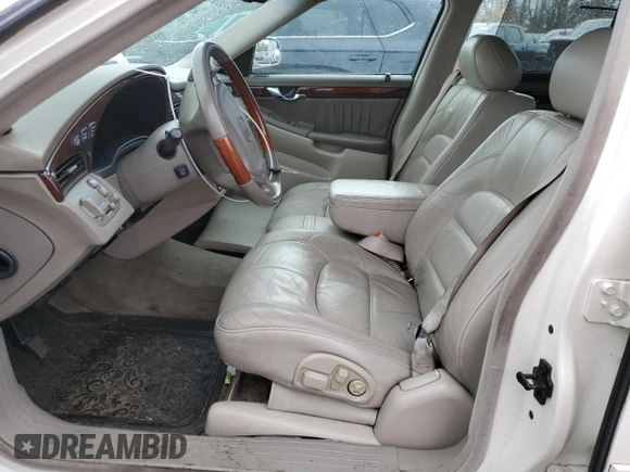 2002 Cadillac DeVille DHS z VIN 1G6KE57Y42U277428, wystawiony jako Copart lot #45757115 z przebiegiem 143 741 mil mil oraz Czysty tytuł • Clean title. Historia ofert i sprzedaży dostępna na DreamBid. Obrazek 7.