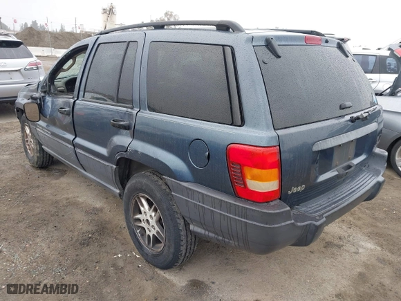 2004 Jeep Grand Cherokee Laredo with VIN 1J4GX48S64C291075, listed as a IAAI auction lot 41805747 with 282,384 mi miles. Bid and sale history available at carsss.com. Image 3.