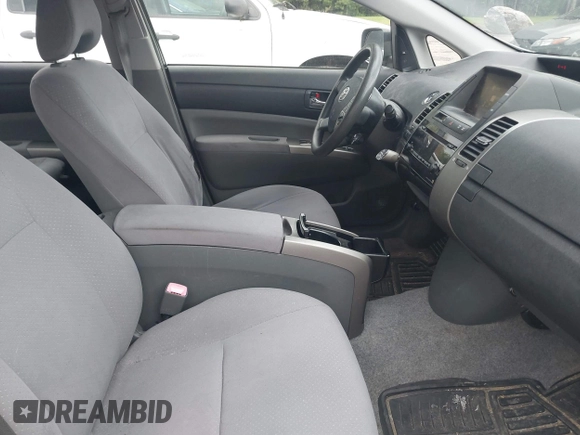 2008 Toyota Prius z VIN JTDKB20U987795330, wystawiony jako IAAI lot #42390791 z przebiegiem 176 251 mil mil oraz . Historia ofert i sprzedaży dostępna na DreamBid. Obrazek 5.