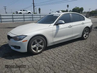 2015 BMW 3 Series 328i with VIN WBA3C1C51FP852887, listed as a Copart auction lot 58882695 with 146,823 mi miles and Salvage title. Bid and sale history available at DreamBid. Image 1.