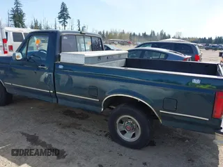 1992 Ford F-150 with VIN 1FTDF15Y1NPA17490, listed as a IAAI auction lot 41970697 with 171,419 mi miles. Bid and sale history available at carsss.com. Image 6.