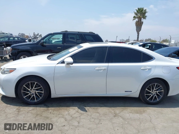 2013 Lexus ES 300h with VIN JTHBW1GGXD2036500, listed as a IAAI auction lot 42153501 with 249,961 mi miles and . Bid and sale history available at DreamBid. Image 14.