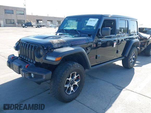 2021 Jeep Wrangler Unlimited Rubicon with VIN 1C4JJXFM5MW722572, listed as a IAAI auction lot 41667167 with Not provided miles and . Bid and sale history available at DreamBid. Image 2.