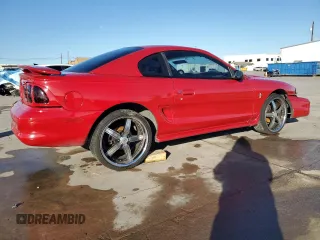 1996 Ford Mustang with VIN 1FALP4041TF234741, listed as a Copart auction lot 85277894 with 113,353 mi miles and Salvage Title. Bid and sale history available at carsss.com. Image 3.