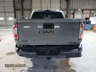 2022 GMC Canyon 4WD AT4 w/Leather with VIN 1GTG6FEN1N1175900, listed as a Copart auction lot 85957514 with 56,811 mi miles and Salvage Title. Bid and sale history available at carsss.com. Image 6.