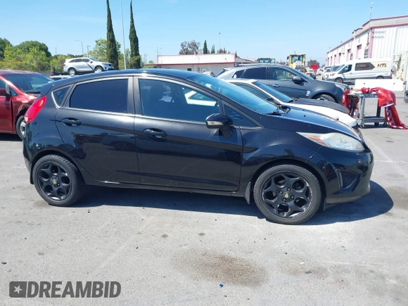 2011 Ford Fiesta SES with VIN 3FADP4FJ9BM181965, listed as a IAAI auction lot 42092140 with 150,304 mi miles. Bid and sale history available at carsss.com. Image 14.