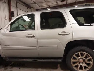 2013 GMC Yukon SLT with VIN 1GKS2CE06DR323343, listed as a IAAI auction lot 41643959 with 246,658 mi miles. Bid and sale history available at carsss.com. Image 15.