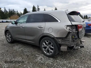 2016 Kia Sorento SXL with VIN 5XYPK4A10GG050814, listed as a Copart auction lot 80686164 with 105,935 mi miles and Salvage Title. Bid and sale history available at carsss.com. Image 2.