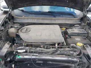 2015 Jeep Cherokee Trailhawk with VIN 1C4PJMBS9FW785545, listed as a IAAI auction lot 41573197 with 124,304 mi miles. Bid and sale history available at carsss.com. Image 10.