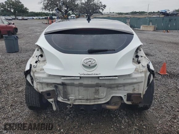 2012 Hyundai Veloster w/Black Int z VIN KMHTC6AD1CU030478, wystawiony jako Copart lot #62715005 z przebiegiem 127 625 mil mil oraz Szkoda całkowita • Salvage title. Historia ofert i sprzedaży dostępna na DreamBid. Obrazek 6.