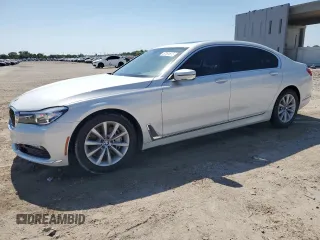 2017 BMW 7 Series 740i z VIN WBA7E2C51HG739932, wystawiony jako Copart lot #57101815 z przebiegiem 58 499 mil mil oraz Szkoda całkowita • Salvage title. Historia ofert i sprzedaży dostępna na DreamBid. Obrazek 1.