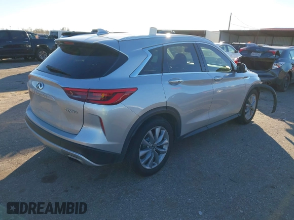 2020 Infiniti QX50 Luxe z VIN 3PCAJ5M37LF105904, wystawiony jako IAAI lot #41251242 z przebiegiem 66 806 mil mil oraz . Historia ofert i sprzedaży dostępna na DreamBid. Obrazek 4.