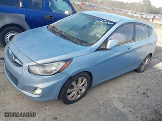 2012 Hyundai Accent SE with VIN KMHCU5AE2CU019828, listed as a IAAI auction lot 41904860 with 151,171 mi miles. Bid and sale history available at carsss.com. Image 2.
