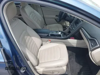 2018 Ford Fusion Energi SE with VIN 3FA6P0PU0JR196091, listed as a IAAI auction lot 42017867 with 70,284 mi miles. Bid and sale history available at carsss.com. Image 5.