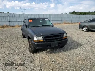 1999 Ford Ranger XL with VIN 1FTZR15V1XPB88455, listed as a Copart auction lot 61976915 with 117,711 mi miles and Salvage title. Bid and sale history available at DreamBid. Image 13.