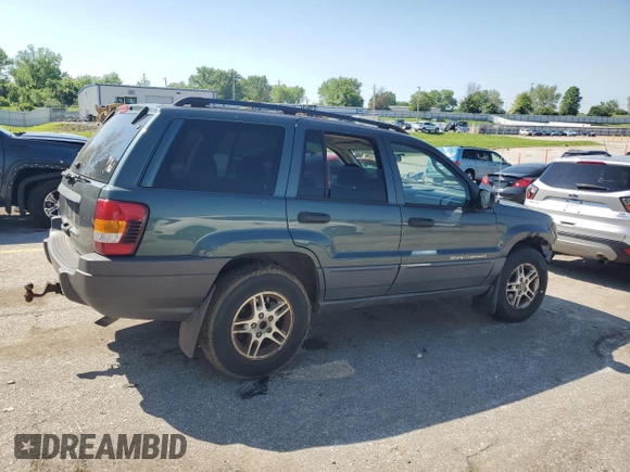 2002 Jeep Grand Cherokee Laredo with VIN 1J4GW48S02C174656, listed as a Copart auction lot 56954155 with 235,427 mi miles and Salvage title. Bid and sale history available at DreamBid. Image 3.