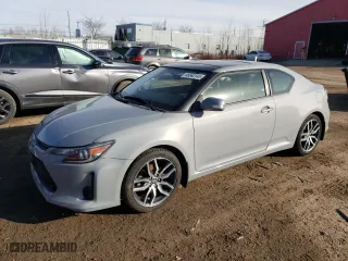 2014 Scion tC with VIN JTKJF5C7XE3086652, listed as a Copart auction lot 46542145 with 216,577 mi miles and Salvage Title. Bid and sale history available at carsss.com. Image 1.
