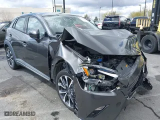 2019 Mazda CX-3 Grand Touring with VIN JM1DKDD71K1445905, listed as a IAAI auction lot 41674243 with 64,949 mi miles. Bid and sale history available at carsss.com. Image 1.