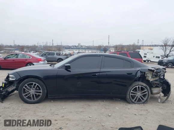 2019 Dodge Charger SXT with VIN 2C3CDXJG7KH757728, listed as a IAAI auction lot 41797017 with 68,063 mi miles and . Bid and sale history available at DreamBid. Image 13.