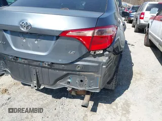 2019 Toyota Corolla L with VIN 2T1BURHE4KC134729, listed as a IAAI auction lot 41779629 with 240,685 mi miles. Bid and sale history available at carsss.com. Image 18.