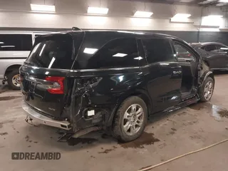 2018 Honda Odyssey Elite with VIN 5FNRL6H92JB110572, listed as a IAAI auction lot 41387270 with 159,806 mi miles and . Bid and sale history available at DreamBid. Image 4.