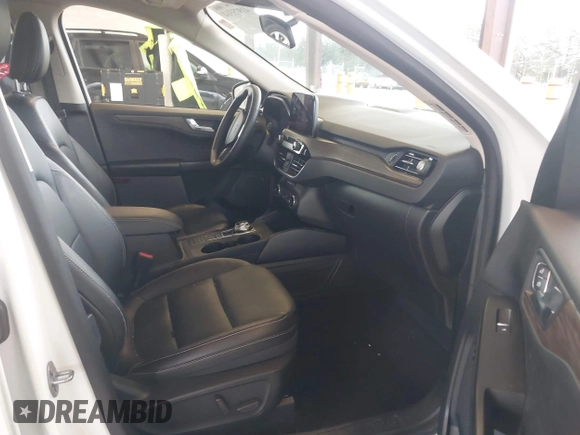 2020 Ford Escape Titanium Hybrid z VIN 1FMCU9DZ8LUA58350, wystawiony jako IAAI lot #41975564 z przebiegiem 38 387 mil mil oraz . Historia ofert i sprzedaży dostępna na DreamBid. Obrazek 5.