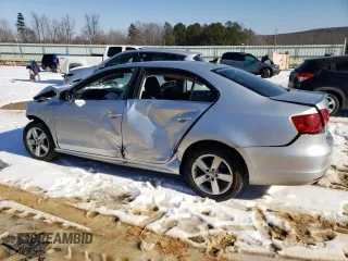 2012 Volkswagen Jetta TDI w/Premium with VIN 3VWLL7AJXCM038466, listed as a Copart auction lot 87885425 with 264,882 mi miles and Salvage title. Bid and sale history available at DreamBid. Image 2.