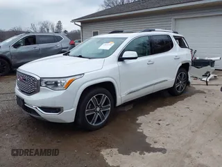 2018 GMC Acadia Denali with VIN 1GKKNXLS3JZ106525, listed as a IAAI auction lot 42012726 with 112,698 mi miles and . Bid and sale history available at carsss.com. Image 2.