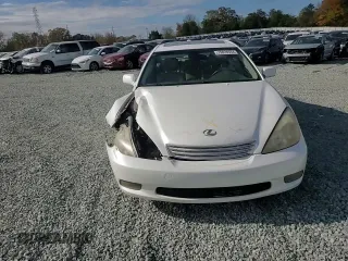 2002 Lexus ES 300 with VIN JTHBF30GX25018502, listed as a Copart auction lot 79828334 with 296,986 mi miles and Salvage Title. Bid and sale history available at DreamBid. Image 10.