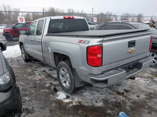 2018 Chevrolet Silverado 1500 LT with VIN 2GCVKREC5J1107722, listed as a IAAI auction lot 41695194 with 82,969 mi miles. Bid and sale history available at carsss.com. Image 3.