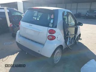 2015 Smart fortwo Passion z VIN WMEEJ3BA4FK788712, wystawiony jako IAAI lot #41219852 z przebiegiem 52 243 mil mil oraz . Historia ofert i sprzedaży dostępna na DreamBid. Obrazek 4.
