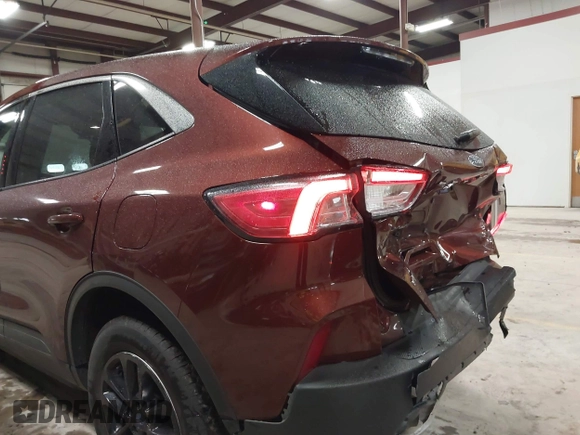 2021 Ford Escape SE with VIN 1FMCU9G69MUA91893, listed as a IAAI auction lot 42313453 with 71,278 mi miles and . Bid and sale history available at DreamBid. Image 6.