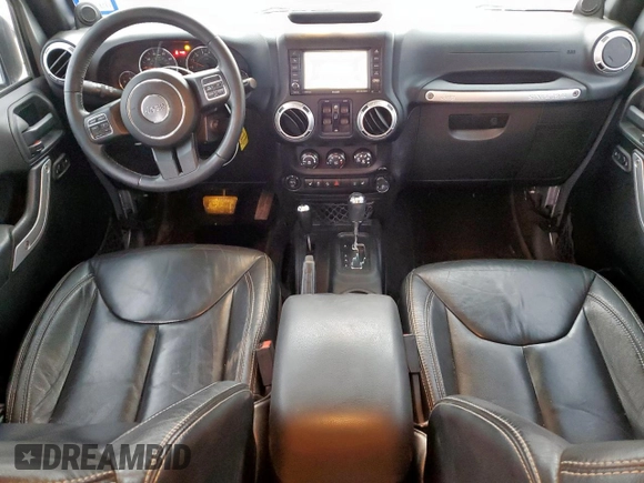 2014 Jeep Wrangler Unlimited Rubicon с VIN 1C4HJWFG3EL322449, выставлен на аукционе Copart как лот 57187665 с пробегом 122 469 миль миль и Списание • Salvage title. История ставок и продаж доступна на DreamBid. Изображение 8.