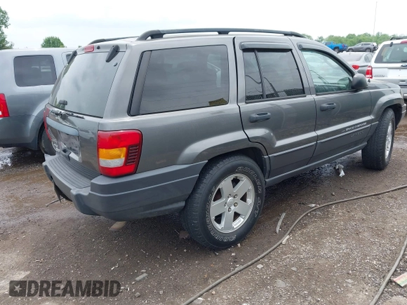 2003 Jeep Grand Cherokee Laredo z VIN 1J4GW48S73C545863, wystawiony jako IAAI lot #42222247 z przebiegiem 128 529 mil mil oraz . Historia ofert i sprzedaży dostępna na DreamBid. Obrazek 4.