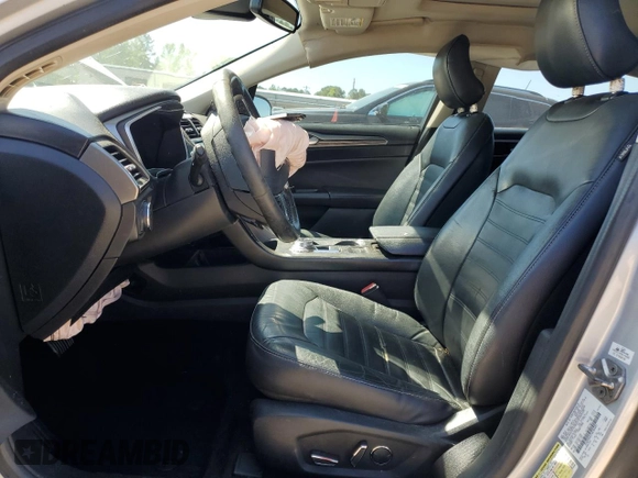 2017 Ford Fusion SE z VIN 3FA6P0HD7HR184691, wystawiony jako Copart lot #52515085 z przebiegiem 113 275 mil mil oraz Szkoda całkowita • Salvage title. Historia ofert i sprzedaży dostępna na DreamBid. Obrazek 7.