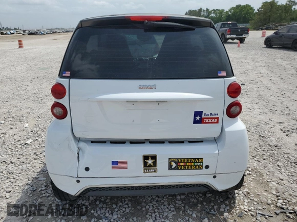2015 Smart fortwo Passion с VIN WMEEJ3BA6FK807938, выставлен на аукционе Copart как лот 53860475 с пробегом 77 748 миль миль и Списание • Salvage title. История ставок и продаж доступна на DreamBid. Изображение 6.