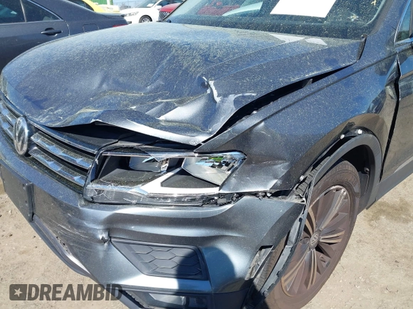 2018 Volkswagen Tiguan SEL with VIN 3VV3B7AX5JM036164, listed as a IAAI auction lot 41876403 with 108,269 mi miles and . Bid and sale history available at DreamBid. Image 6.