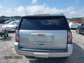 2015 GMC Yukon SLT z VIN 1GKS2BKC0FR100064, wystawiony jako IAAI lot #41941462 z przebiegiem 136 740 mil mil oraz . Historia ofert i sprzedaży dostępna na DreamBid. Obrazek 16.