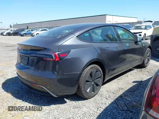 2025 Tesla Model 3 Long Range with VIN 5YJ3E1EA1SF884167, listed as a IAAI auction lot 41976320 with 3,146 mi miles and . Bid and sale history available at DreamBid. Image 4.