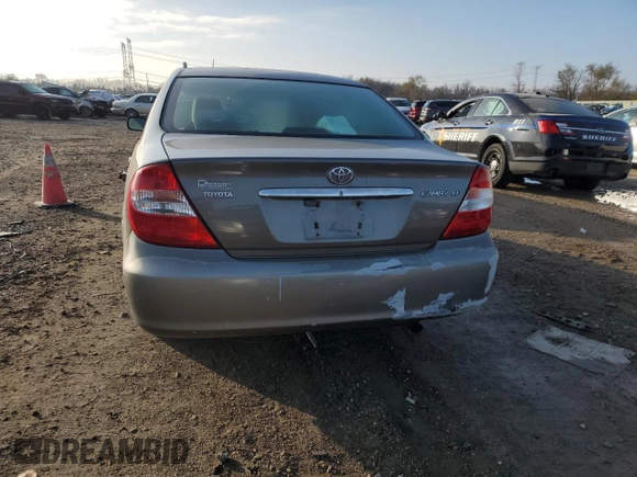 2004 Toyota Camry LE with VIN 4T1BE32K54U811927, listed as a Copart auction lot 80942704 with 197,990 mi miles and Clean title. Bid and sale history available at DreamBid. Image 6.