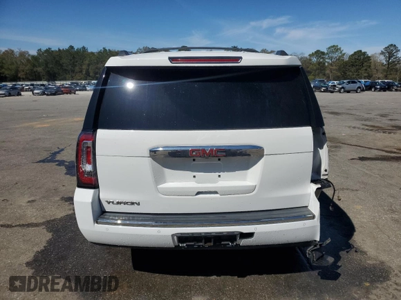 2015 GMC Yukon Denali with VIN 1GKS1CKJ9FR566390, listed as a Copart auction lot 48472835 with 167,719 mi miles and Salvage Title. Bid and sale history available at carsss.com. Image 6.