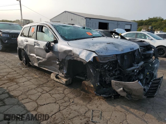 2020 Jeep Grand Cherokee Overland with VIN 1C4RJFCG3LC251579, listed as a Copart auction lot 70312594 with 59,656 mi miles and Salvage Title. Bid and sale history available at carsss.com. Image 4.