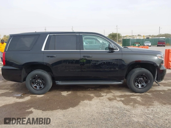 2018 Chevrolet Tahoe Commercial z VIN 1GNLCDEC0JR291831, wystawiony jako IAAI lot #40681194 z przebiegiem 111 711 mil mil oraz . Historia ofert i sprzedaży dostępna na DreamBid. Obrazek 13.
