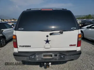 2001 GMC Yukon SLT z VIN 1GKEC13T51J117159, wystawiony jako Copart lot #55241255 z przebiegiem 209 440 mil mil oraz Szkoda całkowita • Salvage title. Historia ofert i sprzedaży dostępna na DreamBid. Obrazek 6.