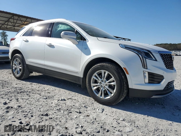 2020 Cadillac XT5 Premium Luxury FWD with VIN 1GYKNCRSXLZ165905, listed as a Copart auction lot 87835085 with 56,001 mi miles and Salvage Title. Bid and sale history available at carsss.com. Image 4.