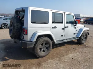 2012 Jeep Wrangler Unlimited Sahara with VIN 1C4HJWEG9CL146750, listed as a IAAI auction lot 41512678 with 94,952 mi miles. Bid and sale history available at carsss.com. Image 4.