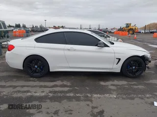 2014 BMW 4 Series 428i xDrive with VIN WBA3N5C56EK196702, listed as a IAAI auction lot 40934482 with 120,292 mi miles. Bid and sale history available at carsss.com. Image 14.